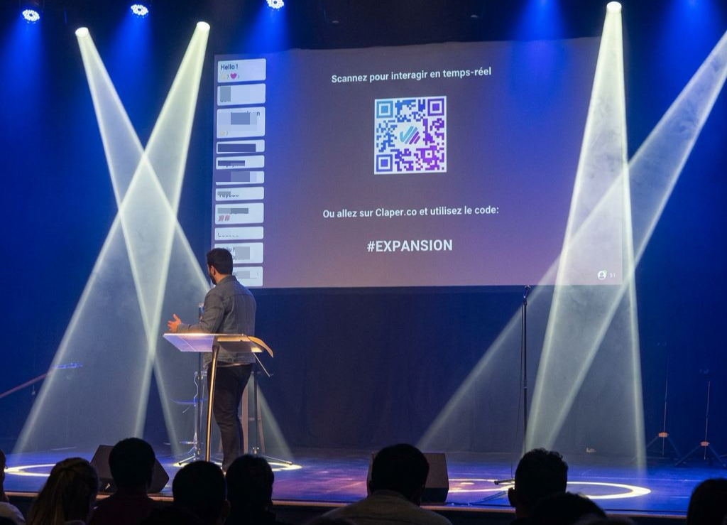 Claper live on stage with real-time audience interactions